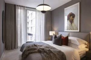 Landsdowne Place Dublin bedroom with a plush bed and elegant furnishings